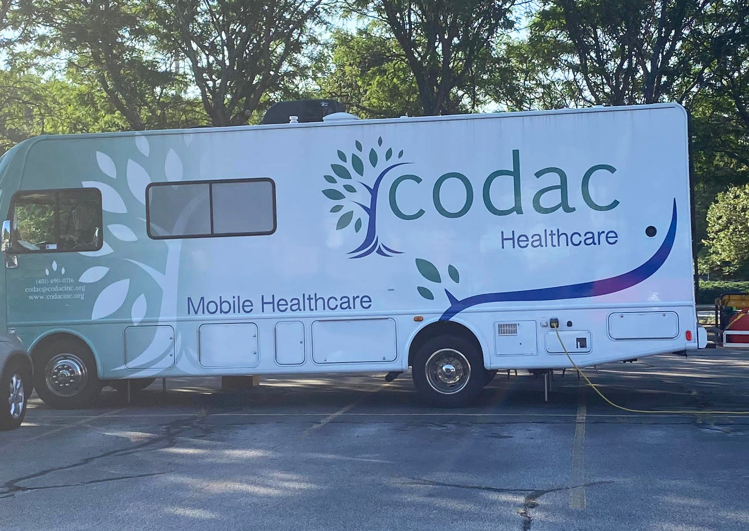 The CODAC mobile medical vehicle in operation from the parking lot of Community Care Alliance in Woonsocket.