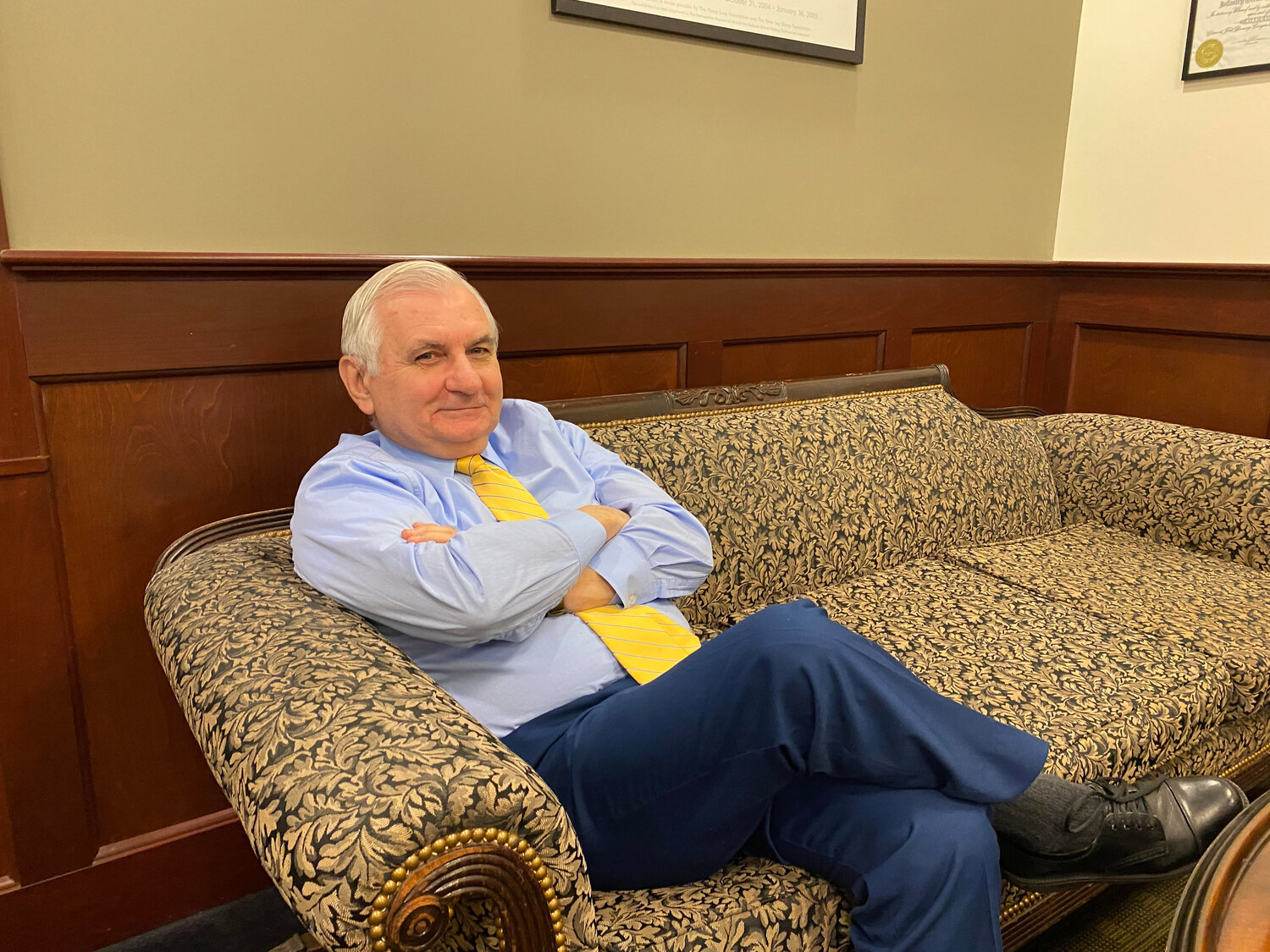 Sen. Jack Reed, sitting on his mother's couch, in his office in Cranston.
